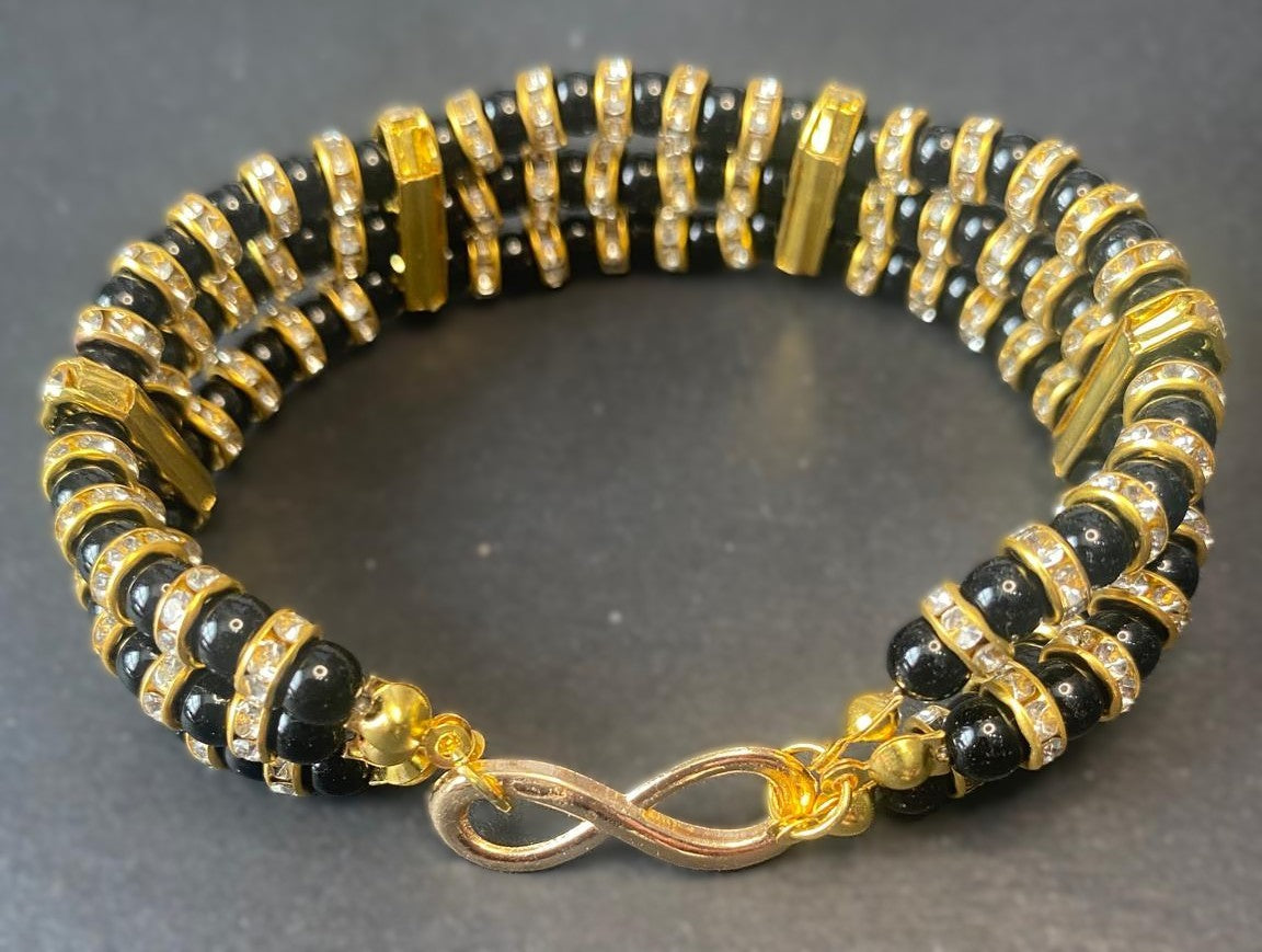 Midnight Radiance Triple Strand Bracelet